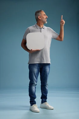 A Saudi Arabian Gulf Arab man wearing casual attire holding a white square board, a marketing advertisement display, with various movements and gestures, against a blue background, full body.