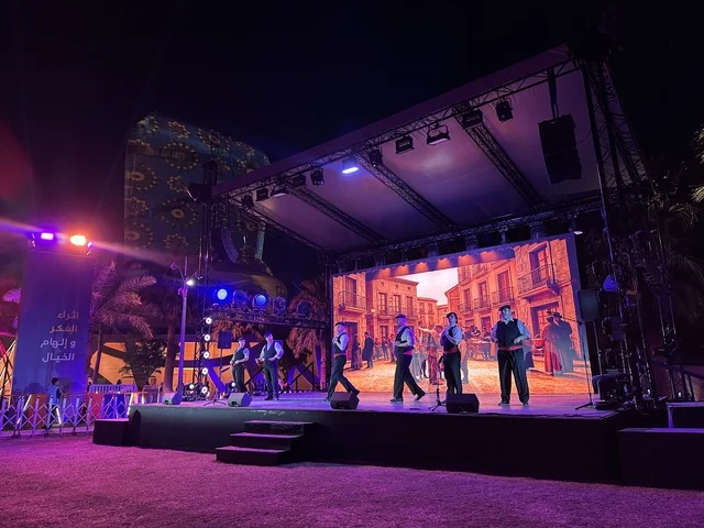 A folk dance show at the Spain Street event at the King Abdulaziz Center for World Culture "Ithra" in Dhahran, Eastern Province, Saudi Arabia, on October 11, 2025, featuring live musical and artistic performances, interactive activities for families and children, flamenco dances, Spanish-themed restaurants and cafes, and a vibrant festive atmosphere.