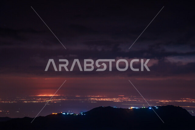 A creative silhouette of the Hasher Mountains in Al-Dayer Governorate in the Jazan region of Saudi Arabia, tourism in Saudi Arabia, scenic landscapes in Saudi Arabia, mountainous heights, the beauty of nature in Saudi Arabia, the beauty of the sky scenery