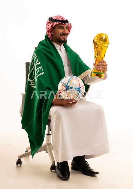 Saudi Man Holding Football and Trophy with Flag