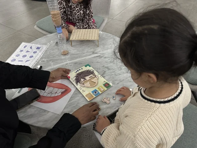 Cognitive activities and educational workshops, World Education Day at the Culture Library, Dammam Public Library, Kingdom of Saudi Arabia, on January 30, 2026. An educational and cultural event that highlights the importance of education and its role in building communities, featuring student participation and interactive dialogue, in an inspiring cultural environment that celebrates knowledge and supports sustainable learning.