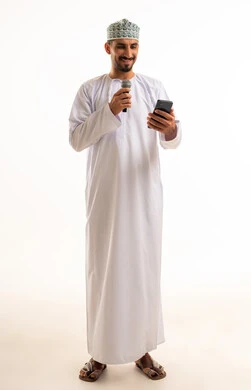 Omani Man Holding Microphone and Smartphone White Background