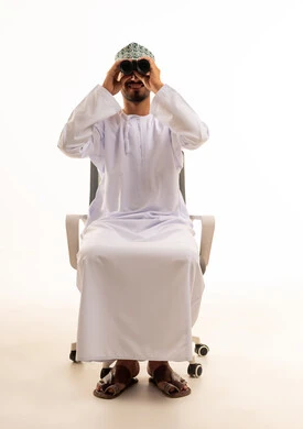 Omani Man Looking Through Binoculars on White Background