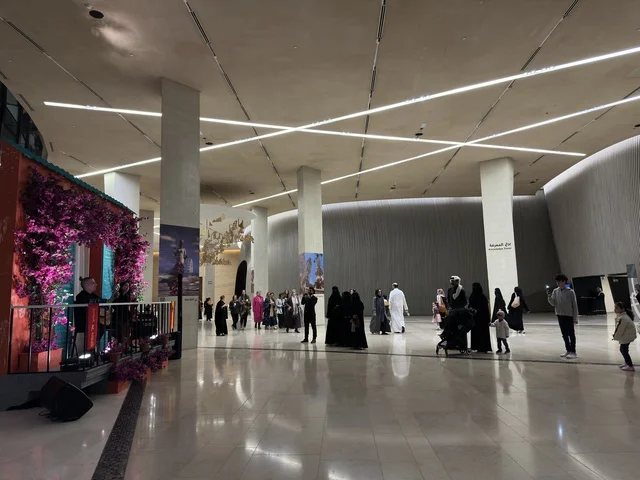 Visitors gathered in front of a musical performance at the Spain Street event at the King Abdulaziz Center for World Culture "Ithra" in Dhahran, Eastern Province, Saudi Arabia, on October 11, 2025. There were live musical and artistic performances, interactive activities for families and children, flamenco dances, Spanish-themed restaurants and cafes, and a vibrant festive atmosphere.