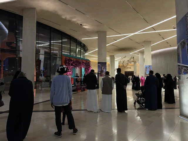 Visitors gathered in front of a musical performance at the Spain Street event at the King Abdulaziz Center for World Culture "Ithra" in Dhahran, Eastern Province, Saudi Arabia, on October 11, 2025. There were live musical and artistic performances, interactive activities for families and children, flamenco dances, Spanish-themed restaurants and cafes, and a vibrant festive atmosphere.