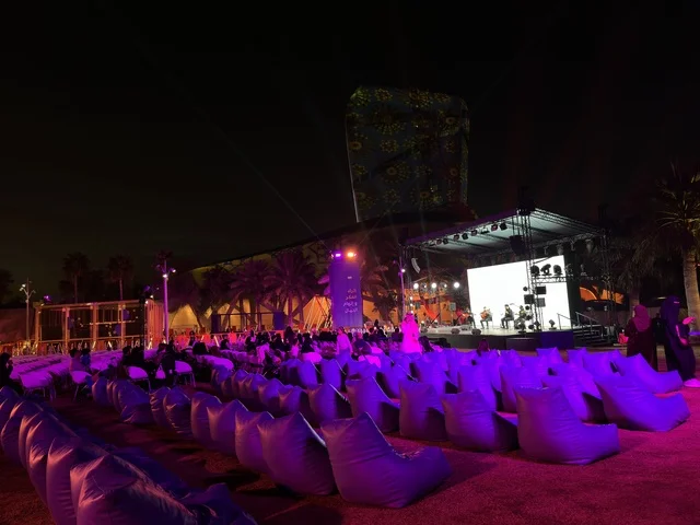 A live musical and artistic performance at the Spain Street event at the King Abdulaziz Center for World Culture "Ithra" in Dhahran, Eastern Province, Saudi Arabia, on October 11, 2025, featuring interactive activities for families and children, flamenco dances, Spanish-themed restaurants and cafes, and a vibrant festive atmosphere.