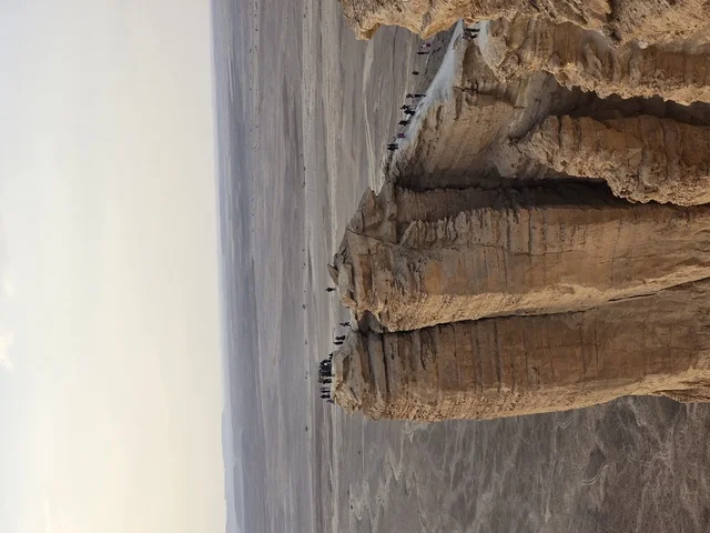 Historical landmarks, rocky mountains and highlands, rocky peaks, desert areas, the Edge of the World, Tuwaiq Mountains in Najd in the Kingdom of Saudi Arabia, tourism in Saudi Arabia, tourism in the Kingdom of Saudi Arabia.