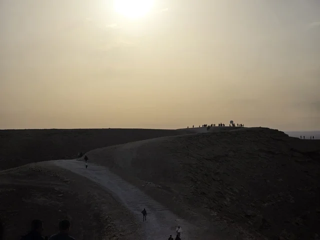 A prominent natural destination, the Grand Canyon overlook, a natural view of the Edge of the World, the Tuwaiq Mountains in Riyadh, mountains in Najd in the Kingdom of Saudi Arabia, desert areas, rocky mountains and elevations, rocky peaks, historical landmarks, tourism in Saudi Arabia.