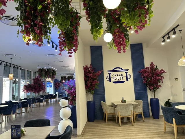 Elegant decor in a café at the Beach Mall in Dammam, Eastern Province, Saudi Arabia, a complete commercial and entertainment center, diverse restaurants and cafés, recreational areas for children and families, seasonal events and marketing activities, local and international stores and brands, family-friendly atmosphere for all categories.