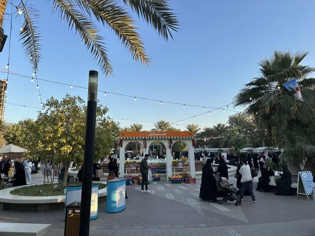 Flowers and plants at the Jood Market in Prince Saud Park in Dhahran, Eastern Province, Saudi Arabia, featuring artisanal products and homemade foods, outdoor shopping areas, family events and recreational activities, an open community market that supports local projects, and a vibrant heritage and social atmosphere.