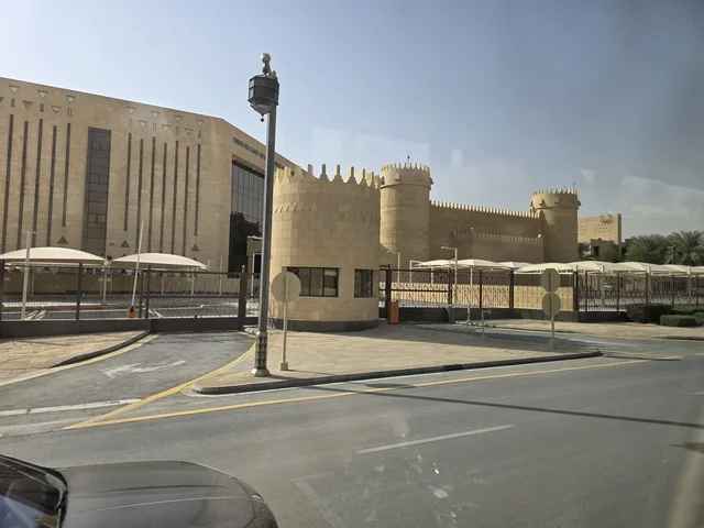 The old walls of Diriyah in the city of Riyadh, Saudi Arabia, are ancient historical archaeological landmarks, showcasing old architectural engineering art. A picture of the archaeological buildings and mud houses in the Al-Turaif neighborhood in Diriyah, with green palm trees, represents the heritage tourism areas in Saudi Arabia.