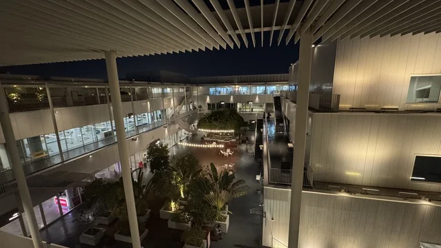 The interior design of a beautiful neighborhood in Jeddah, Saudi Arabia, a contemporary cultural and artistic destination, featuring art galleries and creative spaces, diverse cultural and community events, cafes and artistic gathering areas, an urban environment that embraces creativity and modern arts.