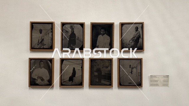 A photography exhibition in a beautiful neighborhood in Jeddah, Saudi Arabia, a contemporary cultural and artistic destination, an urban environment that embraces creativity and modern arts, art exhibitions and creative spaces, diverse cultural and community events, cafes and artistic gathering areas.
