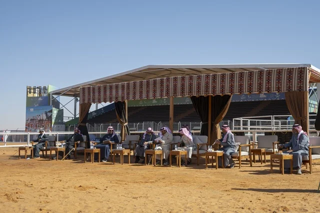 The interaction of camel owners at the King Abdulaziz Festival for Camel Beauty, Saudi Arabia, is a major national heritage event, with wide participation from camel owners, shows and auctions, cultural and heritage activities, competitions, and the beauty of camels, creating a festive atmosphere that reflects the authenticity of Saudi heritage.