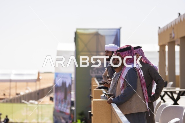 The interaction of camel owners at the King Abdulaziz Festival for Camel Beauty, Saudi Arabia, is a major national heritage event, with wide participation from camel owners, shows and auctions, cultural and heritage activities, competitions, and the beauty of camels, creating a festive atmosphere that reflects the authenticity of Saudi heritage.