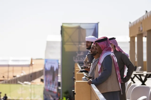 The interaction of camel owners at the King Abdulaziz Festival for Camel Beauty, Saudi Arabia, is a major national heritage event, with wide participation from camel owners, shows and auctions, cultural and heritage activities, competitions, and the beauty of camels, creating a festive atmosphere that reflects the authenticity of Saudi heritage.