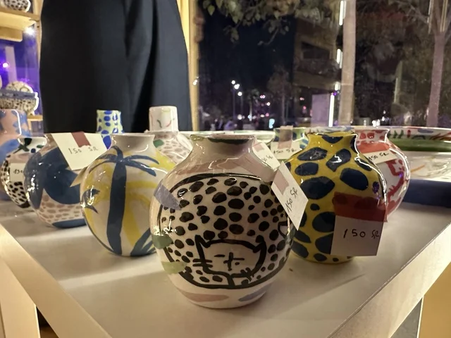 A store and brand at the Spain Street event in the King Abdulaziz Center for World Culture "Ithra" in Dhahran, Eastern Province, Saudi Arabia, on October 11, 2025, featuring interactive activities for families and children, flamenco dances, live musical and artistic performances, Spanish-themed restaurants and cafes, and a vibrant festive atmosphere.