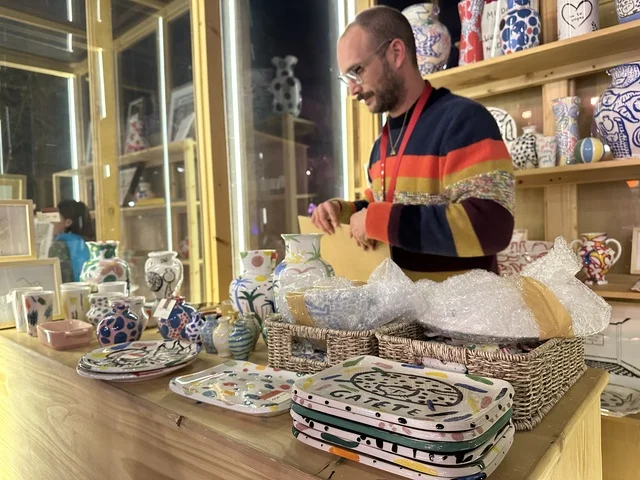 A store and brand at the Spain Street event in the King Abdulaziz Center for World Culture "Ithra" in Dhahran, Eastern Province, Saudi Arabia, on October 11, 2025, featuring interactive activities for families and children, flamenco dances, live musical and artistic performances, Spanish-themed restaurants and cafes, and a vibrant festive atmosphere.