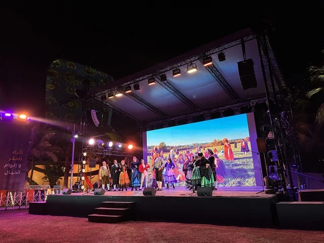 A folk dance show at the Spain Street event in the King Abdulaziz Center for World Culture "Ithra" in Dhahran, Eastern Province, Saudi Arabia, on October 11, 2025, interactive activities for families and children, flamenco dances, live musical and artistic performances, Spanish-themed restaurants and cafes, and a vibrant festive atmosphere.