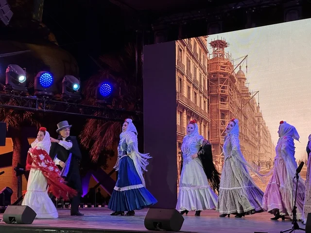 A group of dancers in traditional costumes at the Spain Street event at the King Abdulaziz Center for World Culture "Ithra" in Dhahran, Eastern Province, Saudi Arabia, on October 11, 2025, featuring interactive activities for families and children, flamenco dances, live musical and artistic performances, Spanish-themed restaurants and cafes, and a vibrant festive atmosphere.