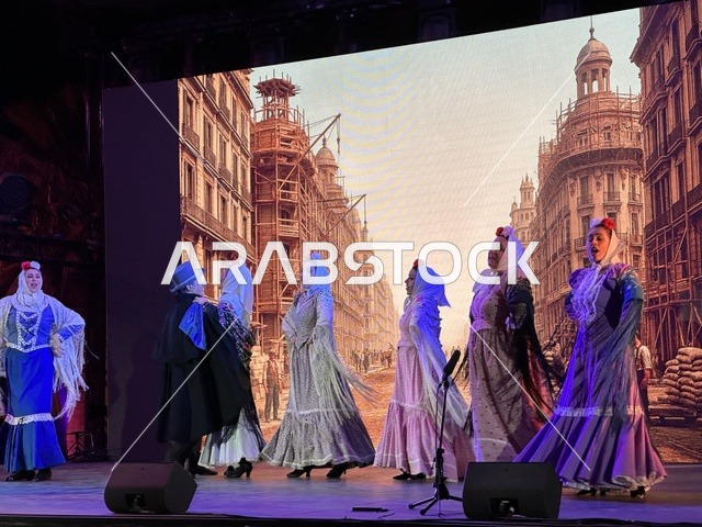 A group of dancers in traditional costumes at the Spain Street event at the King Abdulaziz Center for World Culture "Ithra" in Dhahran, Eastern Province, Saudi Arabia, on October 11, 2025, featuring interactive activities for families and children, flamenco dances, live musical and artistic performances, Spanish-themed restaurants and cafes, and a vibrant festive atmosphere.