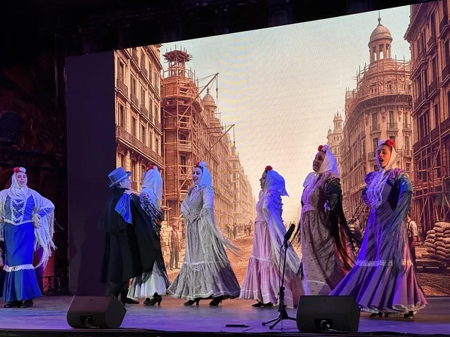 A group of dancers in traditional costumes at the Spain Street event at the King Abdulaziz Center for World Culture "Ithra" in Dhahran, Eastern Province, Saudi Arabia, on October 11, 2025, featuring interactive activities for families and children, flamenco dances, live musical and artistic performances, Spanish-themed restaurants and cafes, and a vibrant festive atmosphere.