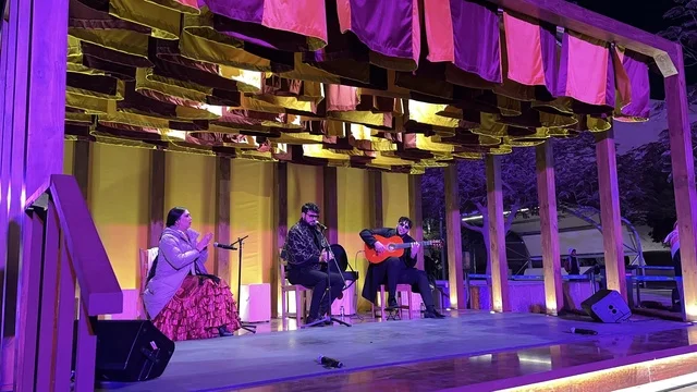 A live music show at the Spain Street event at the King Abdulaziz Center for World Culture "Ithra" in Dhahran, Eastern Province, Saudi Arabia, on October 11, 2025, featuring interactive activities for families and children, flamenco dances, live musical and artistic performances, Spanish-themed restaurants and cafes, and a vibrant festive atmosphere.