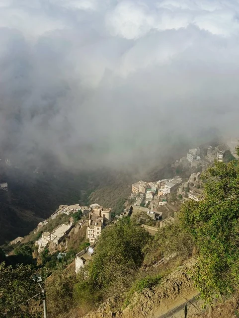 The fog embraces the enchanting nature in the Governorate of Faifa in the Jazan region, southern Saudi Arabia.