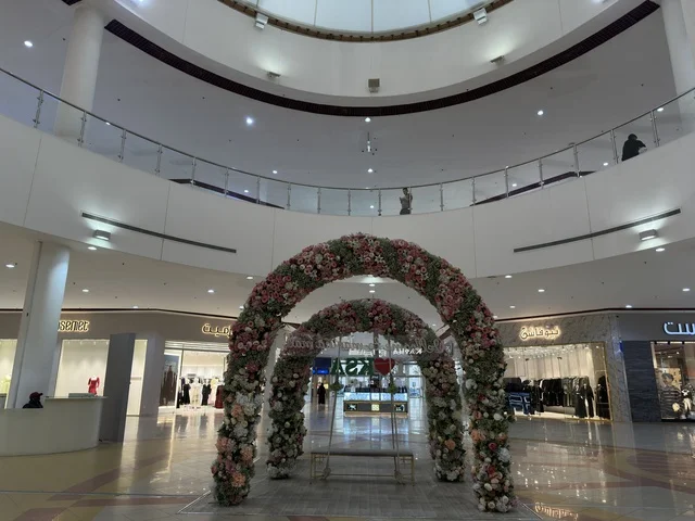 Pink frame decor at Marina Mall in Dammam, Eastern Province, Saudi Arabia, a shopping and entertainment center overlooking the waterfront, featuring diverse shops and brands, restaurants and cafes with sea views, recreational and service facilities, a family destination that combines shopping and entertainment.