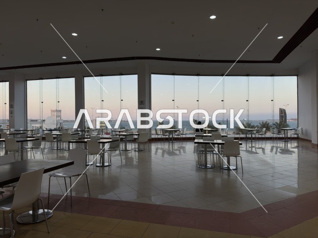 Places to relax in Marina Mall in Dammam City, Eastern Province, Saudi Arabia, a shopping and entertainment center overlooking the waterfront, with diverse shops and brands, restaurants and cafes with sea views, recreational and service facilities, a family destination that combines shopping and entertainment.