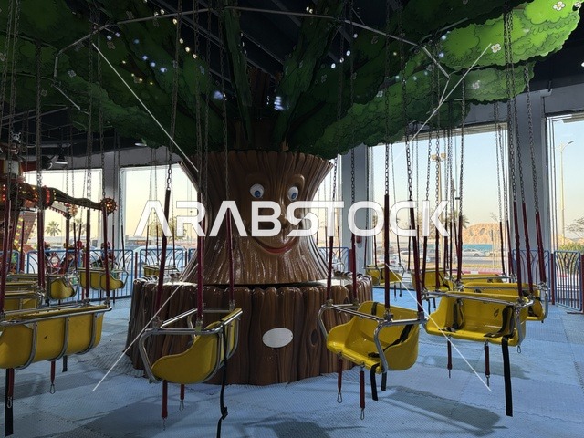 Recreational activities at Marina Mall in Dammam, Eastern Province, Saudi Arabia, a shopping and entertainment center overlooking the waterfront, featuring diverse stores and brands, restaurants and cafes with sea views, recreational and service facilities, a family destination that combines shopping and entertainment.