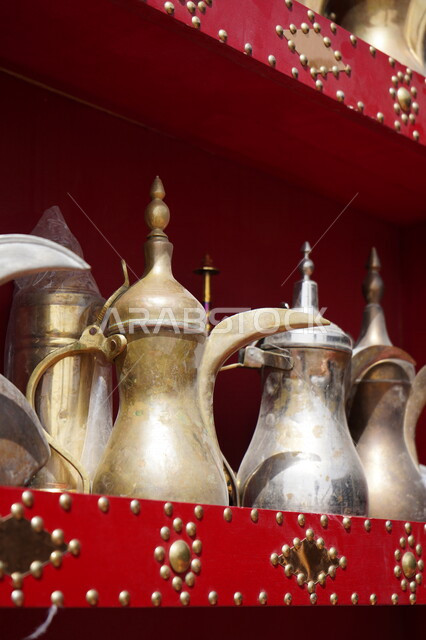 a-picture-of-ancient-oriental-arabic-jugs-on-a-shelf-in-one-of-the
