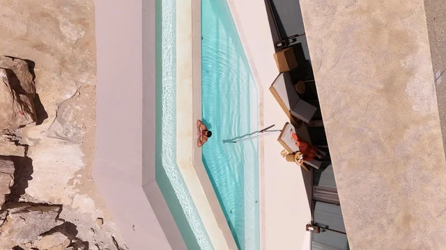 A mountain resort integrated with the rocky nature, Desert Rock in the Kingdom of Saudi Arabia, features an innovative architectural design carved into the mountains, offering a unique tourism experience that combines luxury and sustainability, with stunning desert views, making it a global tourist destination.