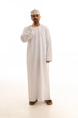 Omani Man in Traditional Dress with Toothache Pain