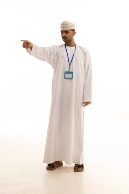 Omani Man in Traditional Dress Pointing on White Background