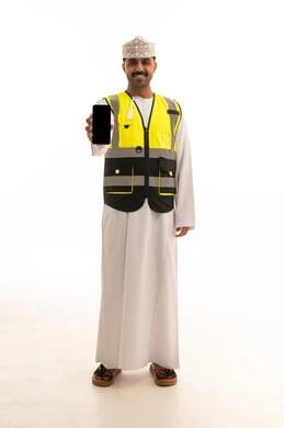 Omani Man in Safety Vest Holding Blank Smartphone
