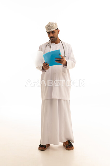 Omani Male Doctor with Medical File on White Background