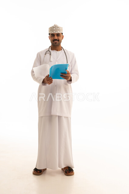 Omani Male Doctor with Medical File on White Background