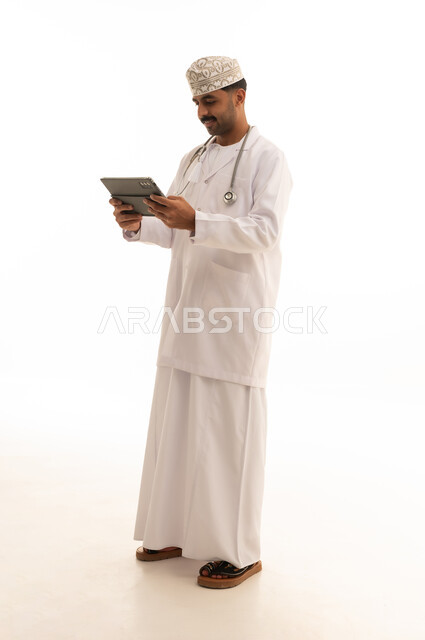 Omani Male Doctor with Tablet on White Background