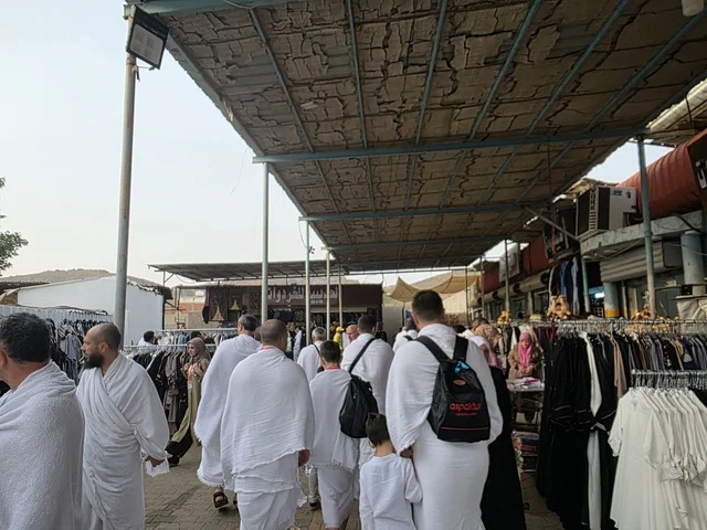 The designated place for entering into the state of Ihram for Hajj and Umrah for those within the boundaries of the Sacred Mosque in Mecca is the Mosque of Hudaybiyyah (Al-Shumaisi Mosque) located in the Al-Shumaisi area on the road to Mecca (Old Jeddah). It is an ancient historical mosque built from black stone and plaster.