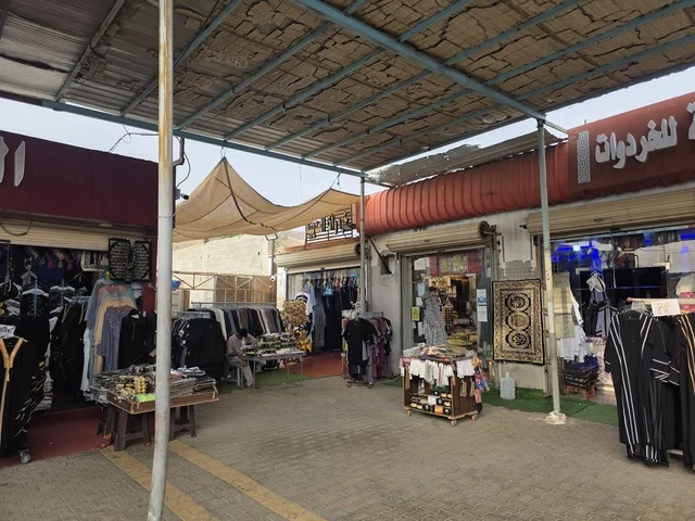 The designated place for entering into the state of Ihram for Hajj and Umrah for those within the boundaries of the Sacred Mosque in Mecca is the Mosque of Hudaybiyyah (Al-Shumaisi Mosque) located in the Al-Shumaisi area on the road to Mecca (Old Jeddah). It is an ancient historical mosque built from black stone and plaster.