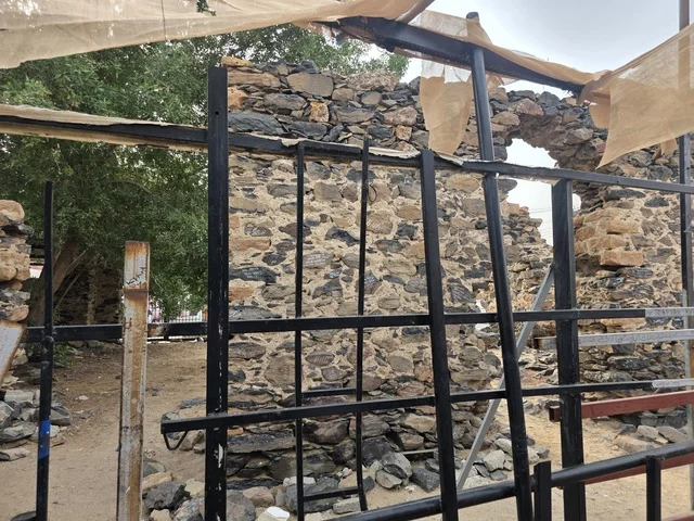 The designated place for entering into the state of Ihram for Hajj and Umrah for those within the boundaries of the Sacred Mosque in Mecca is the Mosque of Hudaybiyyah (Al-Shumaisi Mosque) located in the Al-Shumaisi area on the road to Mecca (Old Jeddah). It is an ancient historical mosque built from black stone and plaster.