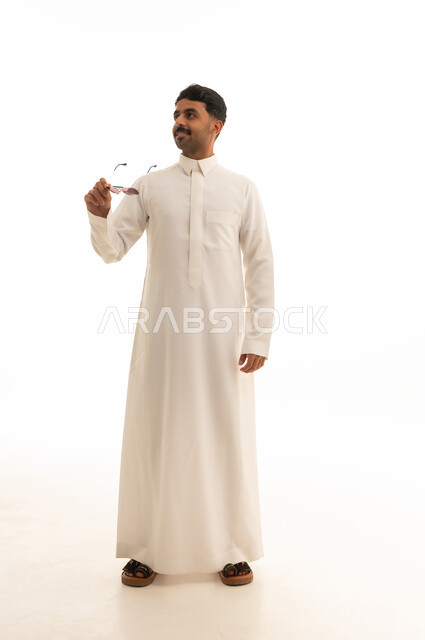 Saudi Man in White Thobe with Sunglasses on White