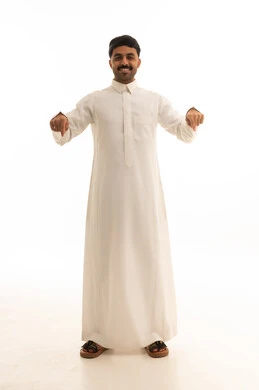 Saudi Man in Traditional Thobe Pointing Downward