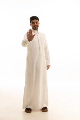 Saudi Man in Traditional Thobe Making Stop Gesture