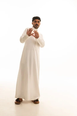 Shocked Saudi Man in White Thobe on White Background