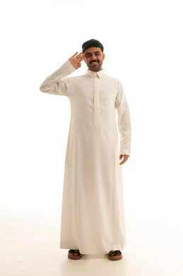 Saudi Man in White Thobe Performing Military Salute