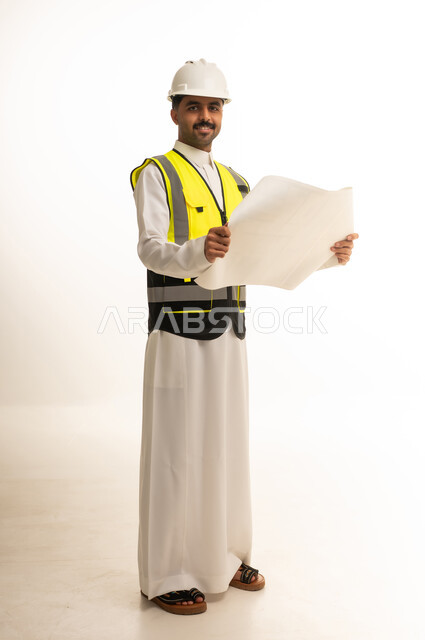 Saudi Engineer with Blueprint on White Background