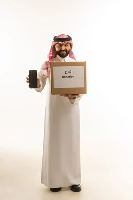 Saudi Man Holding Donation Box and Smartphone