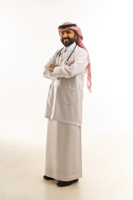 Saudi Male Doctor in Traditional Dress and White Coat